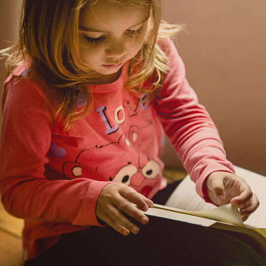 Child holding book